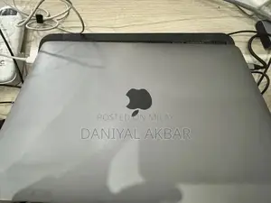 Photo - Apple MacBook Pro 2019 13-inch Laptop with Touch Bar