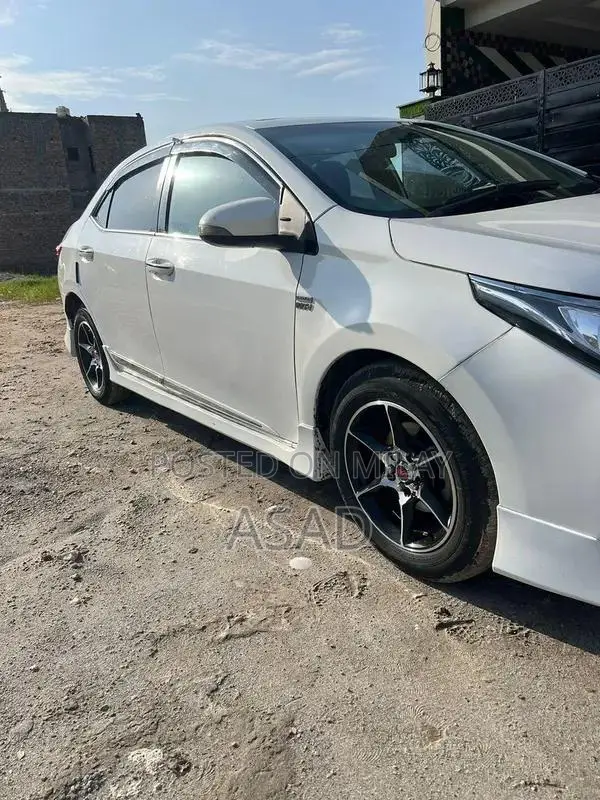 Toyota Corolla Grande Sedan - Low Mileage Reliable Compact Car