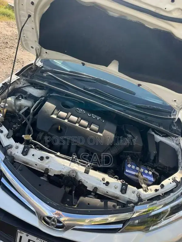 Toyota Corolla Grande Sedan - Low Mileage Reliable Compact Car