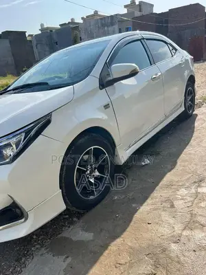 Toyota Corolla Grande Sedan - Low Mileage Reliable Compact Car