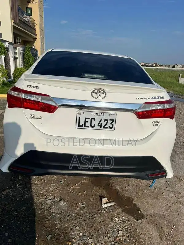 Toyota Corolla Grande Sedan - Low Mileage Reliable Compact Car