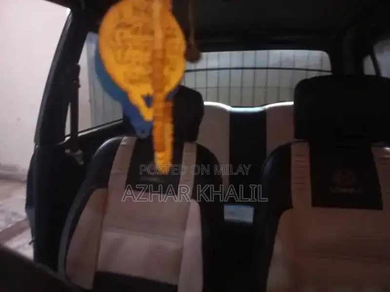 Couery Black Sedan - Versatile 4-Door Vehicle