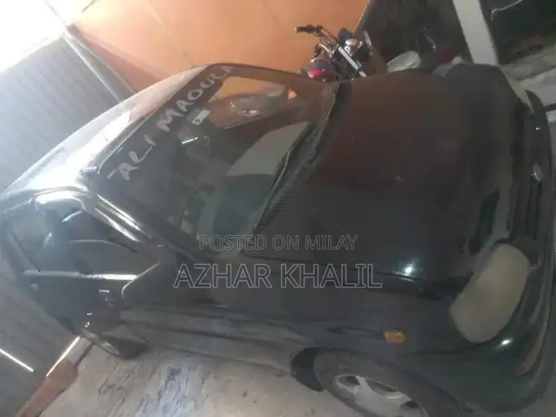 Couery Black Sedan - Versatile 4-Door Vehicle