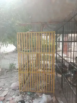 Photo - Iron Hen Cage - Sturdy Poultry Housing Solution