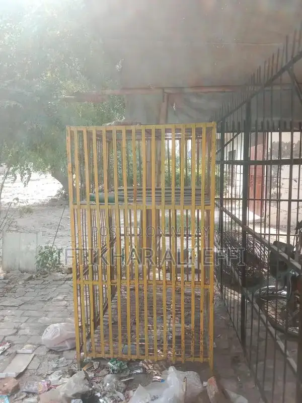 Iron Hen Cage - Sturdy Poultry Housing Solution