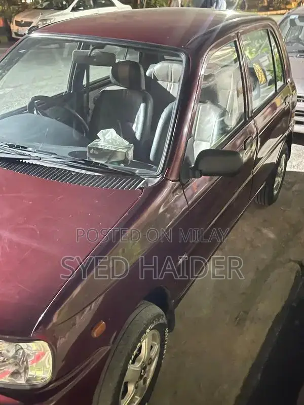 2001 Daihatsu Coure Hatchback - Well-Maintained Red Automatic