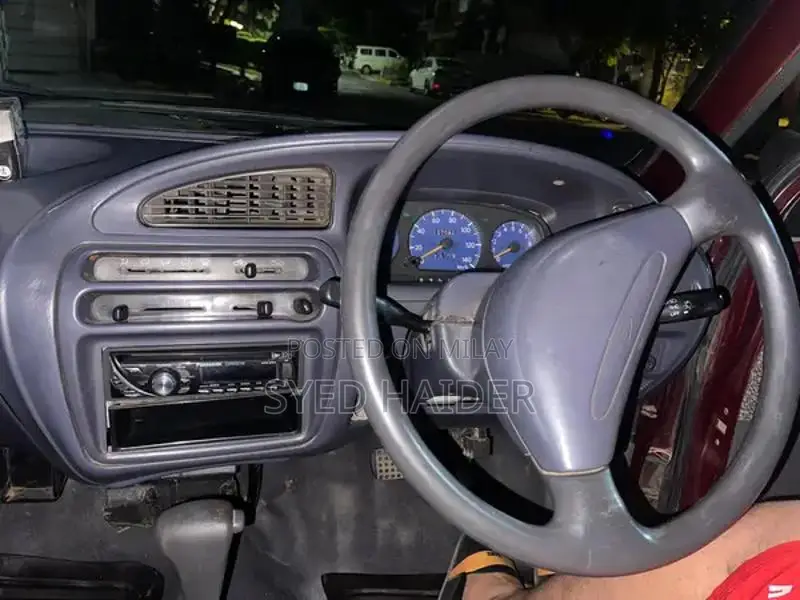 2001 Daihatsu Coure Hatchback - Well-Maintained Red Automatic