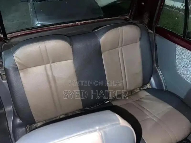 2001 Daihatsu Coure Hatchback - Well-Maintained Red Automatic