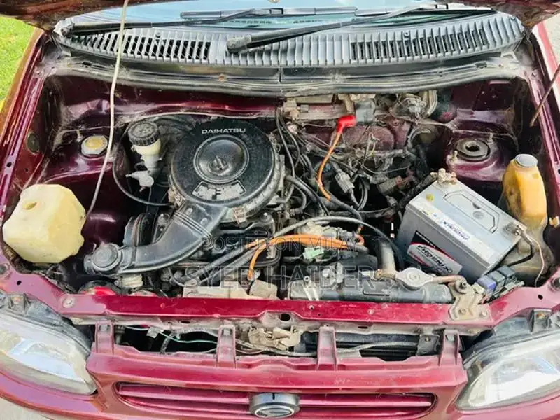 2001 Daihatsu Coure Hatchback - Well-Maintained Red Automatic