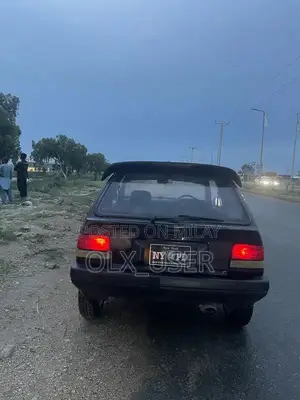 Photo - Suzuki Swift 2-Door Compact Car Project Vehicle