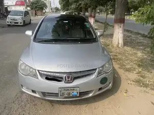 Photo - Honda Civic Reborn Manual Sedan - Well-Maintained Reliable Compact Car