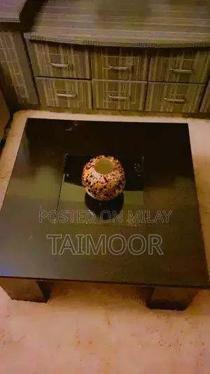 Photo - Central Table in Good Condition - Sturdy Furniture Piece