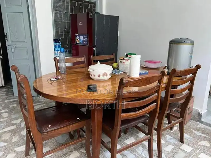 Solid Wood Dining Table with Repair Opportunity