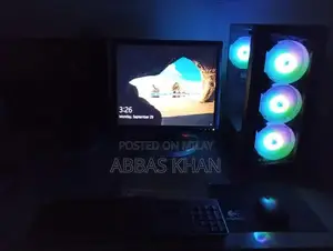 Photo - High-Performance Gaming Desktop with Gaming Chair