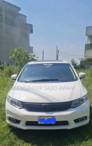 Photo - 2014 Honda Civic UG Prosmatec Sunroof Sedan