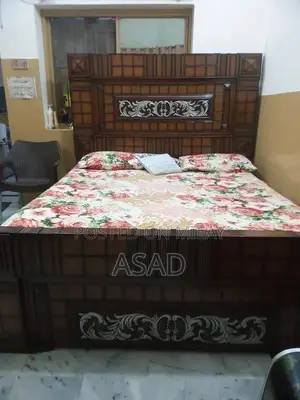 Photo - King Bed Frame - Gently Used, Solid Material, One Year Old