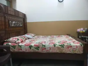 King Bed Frame - Gently Used, Solid Material, One Year Old