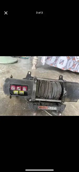 Photo - Heavy-Duty 12V Electric Car Winch for Off-Road Recovery and Towing