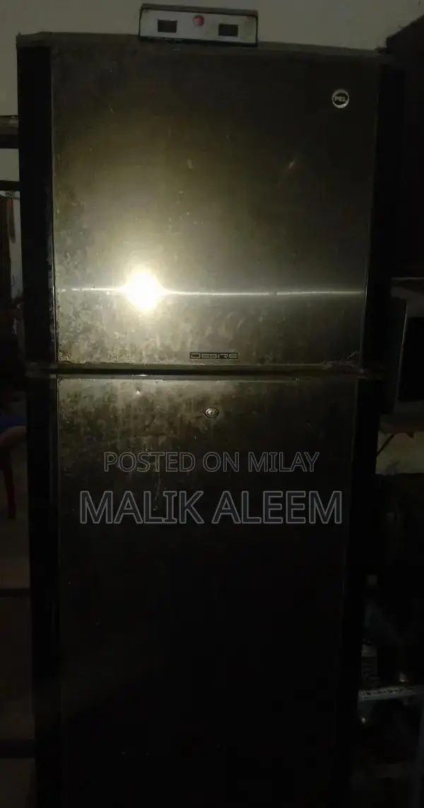 Large PEL Refrigerator - Clean and Functional Home Appliance