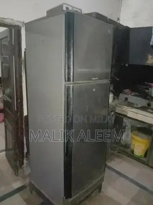 Large PEL Refrigerator - Clean and Functional Home Appliance