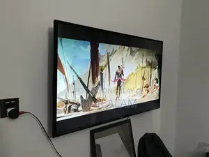 Photo - LG 49-Inch WebOS Smart UHD 4K LED TV with Magic Remote