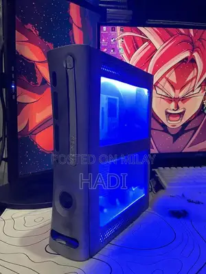 Photo - Custom Transparent Xbox 360 with RGB Controller and Power Brick