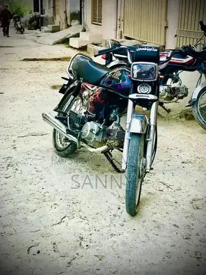 Photo - Honda CD 70 Motorcycle 2024 Model