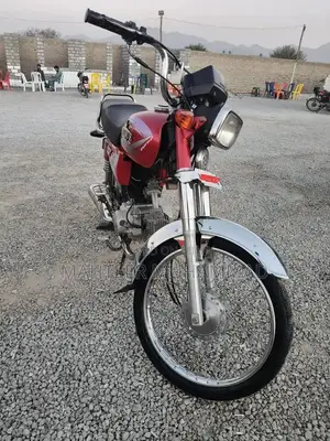 Photo - Unique CD 70 2013 Motorcycle - Well-Maintained City Ride