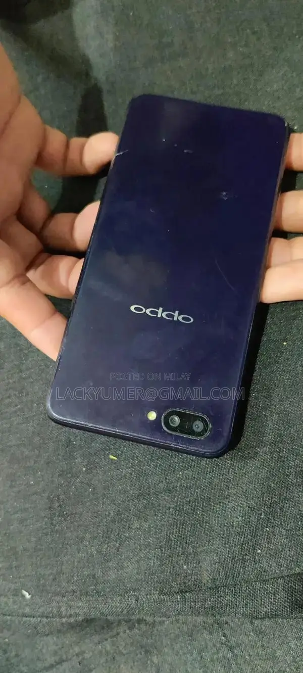 Mobile Phone - Compact Smartphone with Multiple Features