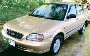 Photo - Suzuki Baleno JXR Compact Sedan