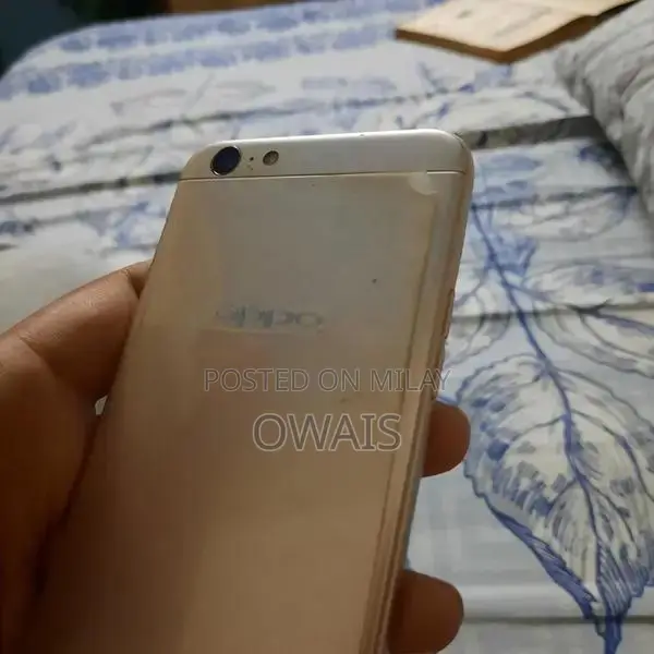 Budget Smartphone with Touchscreen Issues and Moderate Storage