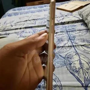 Budget Smartphone with Touchscreen Issues and Moderate Storage