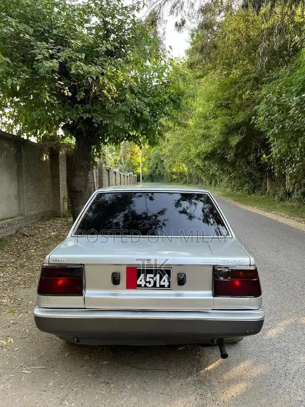 Toyota AE80 Corolla Two-Tone Restored Classic Sedan