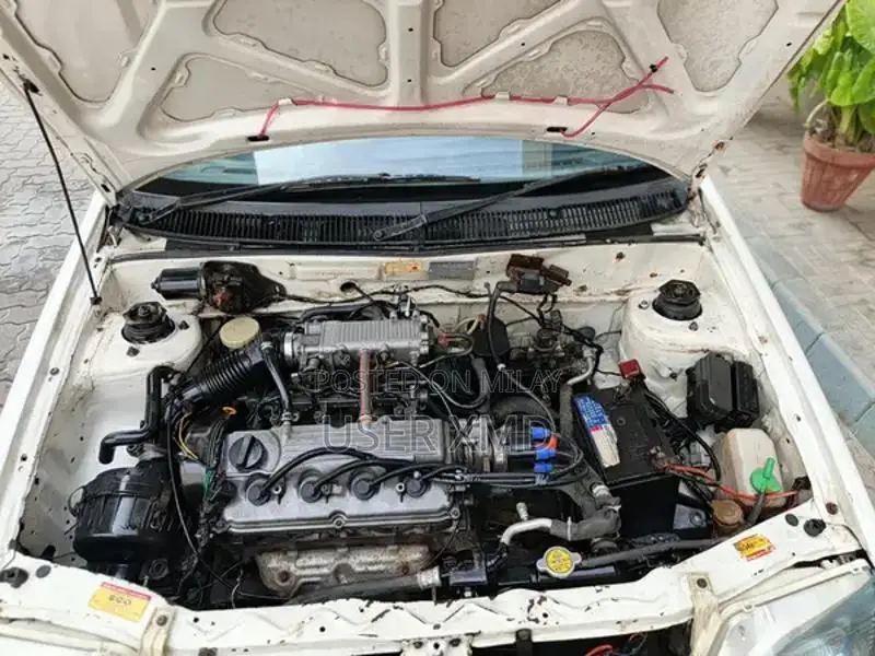 Cultus Sedan Compact Car with New Battery and Documentation