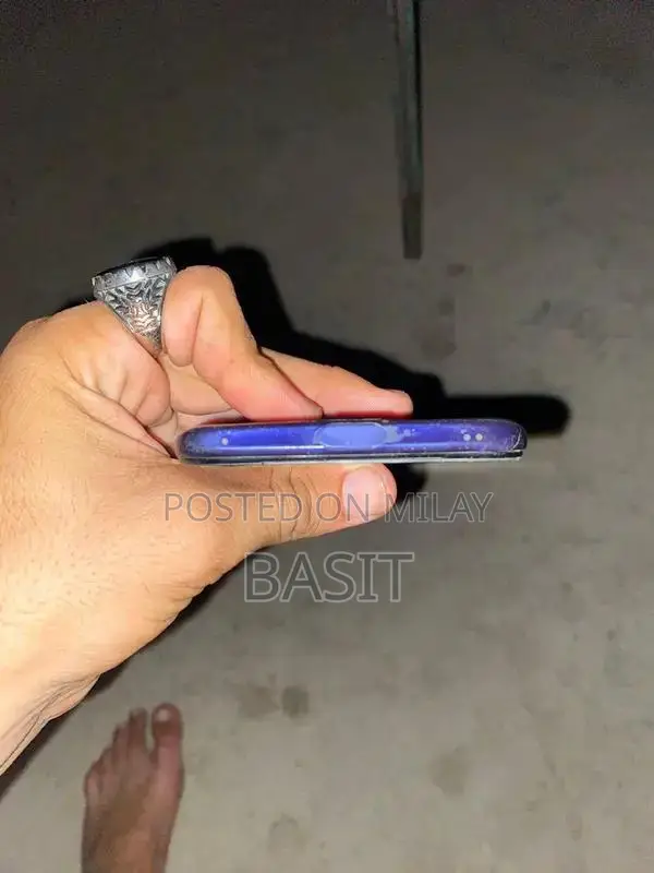 Mid-Range Smartphone with Pop-up Camera and Dual Lens