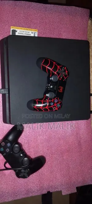 Photo - PlayStation 4 Slim Jailbroken Gaming Console with Pre-Installed Games