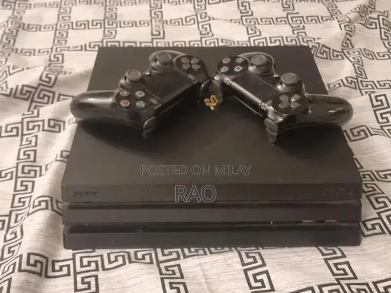 PlayStation 4 Pro Gaming Console 1TB with Dual Controllers