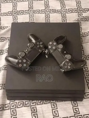 PlayStation 4 Pro Gaming Console 1TB with Dual Controllers