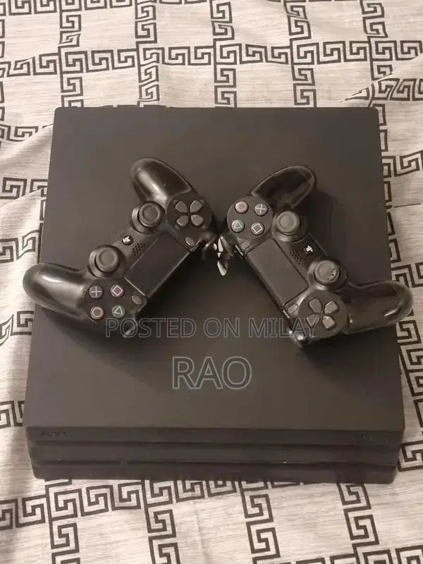 PlayStation 4 Pro Gaming Console 1TB with Dual Controllers