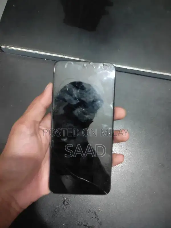 Samsung Galaxy A50 Smartphone with Cracked Screen