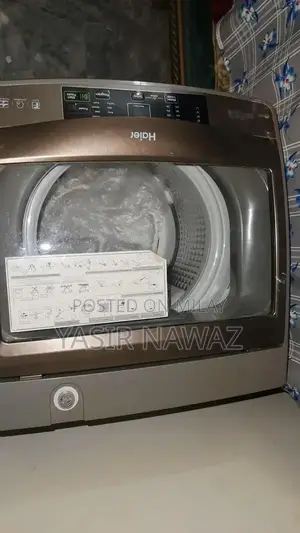 Photo - Haier Washer and Dryer Automatic Combo Machine