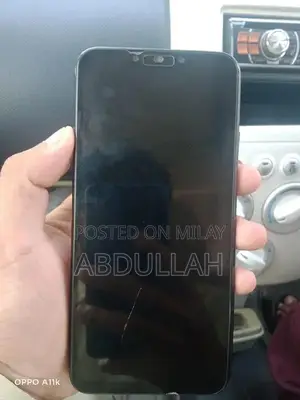 Stylish Mid-Range Smartphone with Quad Camera Setup