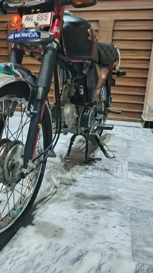 Photo - Honda CD 70 Motorcycle - Classic Commuter Bike