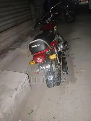 Photo - Honda 70 Motorcycle - Classic Commuter Bike