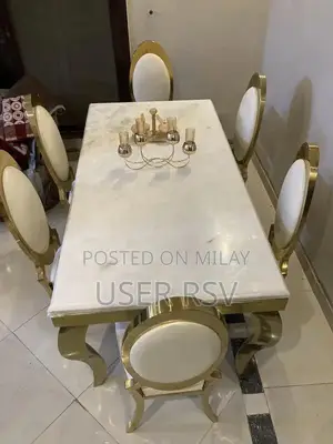 Marble Top Stainless Steel Dining Table with Six Chairs