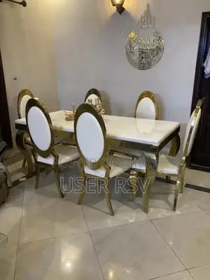 Marble Top Stainless Steel Dining Table with Six Chairs
