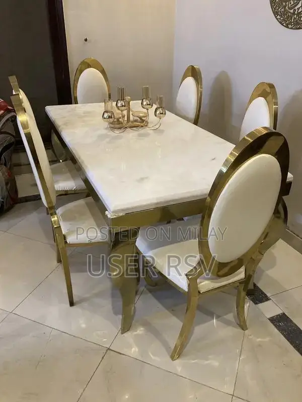 Marble Top Stainless Steel Dining Table with Six Chairs