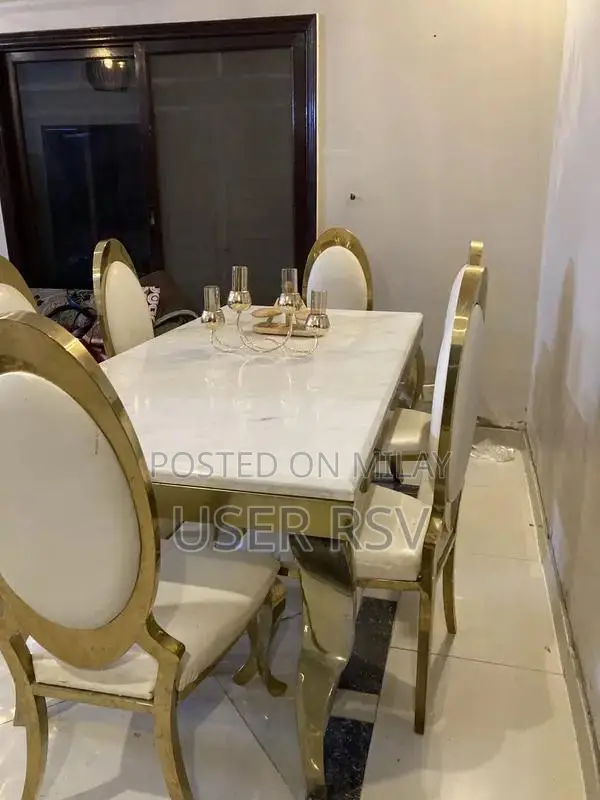Marble Top Stainless Steel Dining Table with Six Chairs