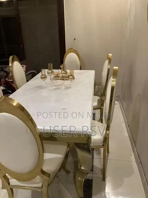 Marble Top Stainless Steel Dining Table with Six Chairs