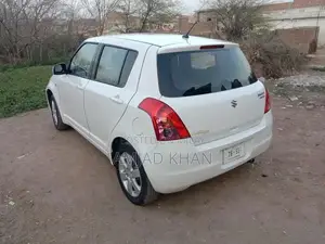 Photo - Genuine Bumper to Bumper Vehicle in Good Condition